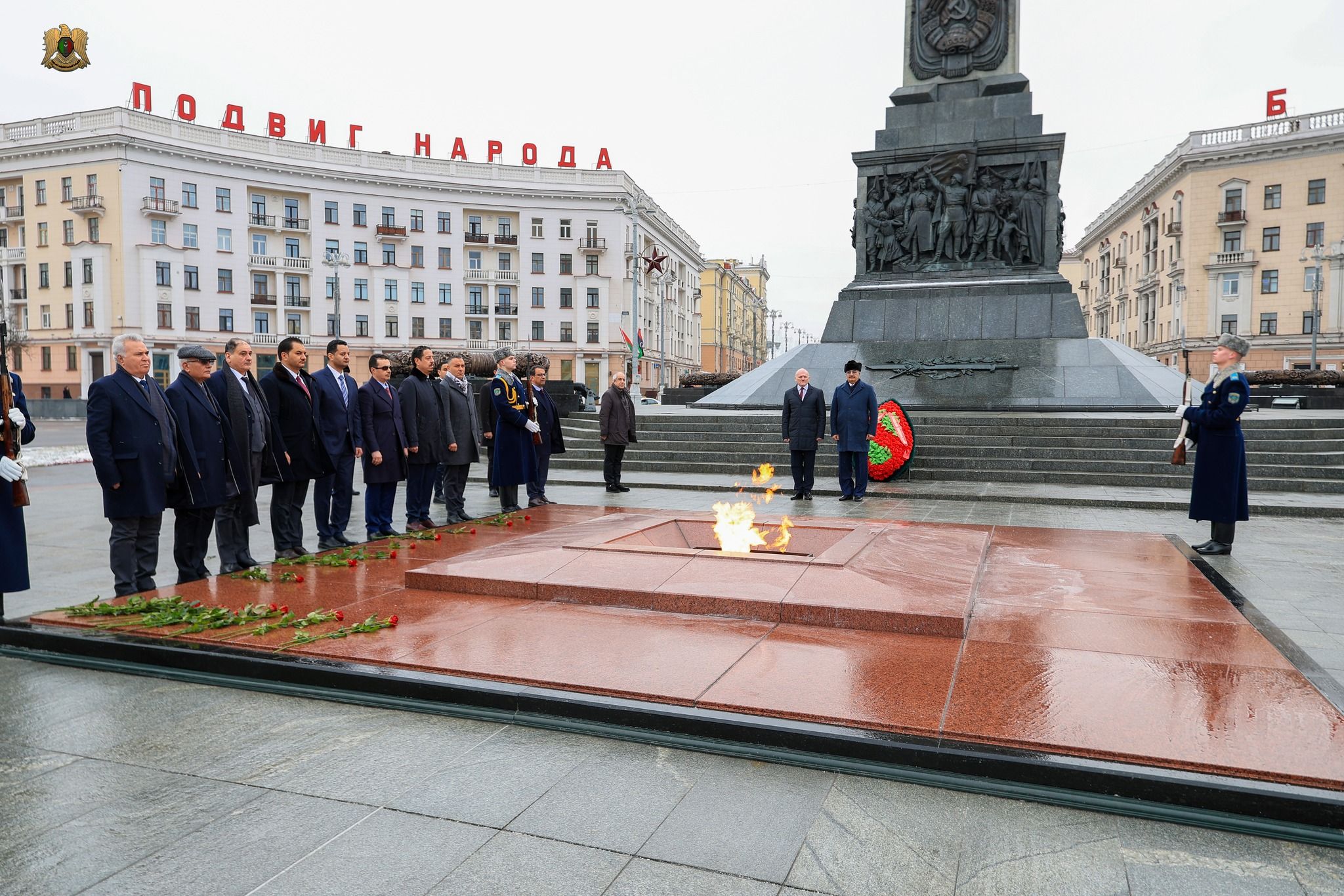 May be an image of 14 people, the Brandenburg Gate and text